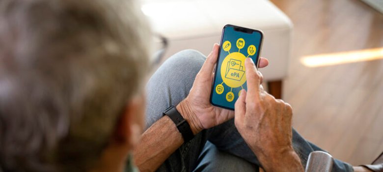 Sitting at home holding smartphone. Sitting at home holding smartphone.